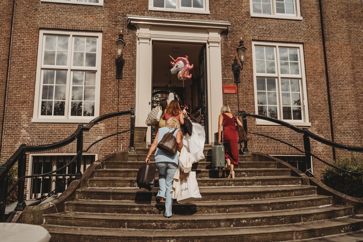 The couple on the venue steps
